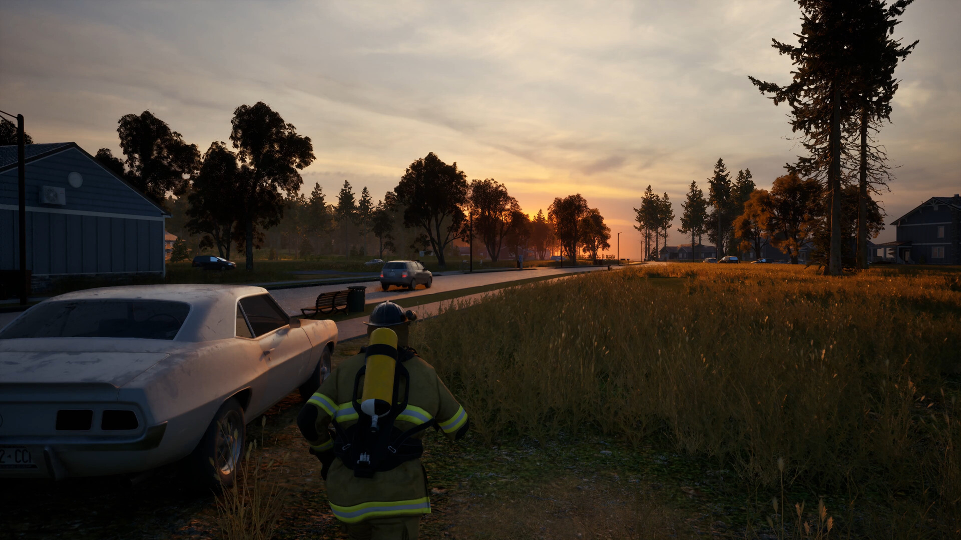 A firefighter walking down a quiet suburban street at sunset